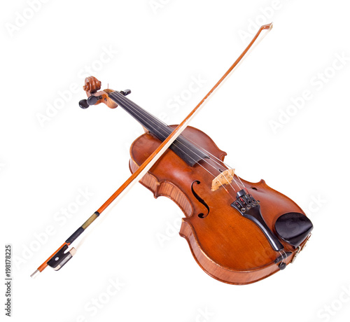 Viola with bow isolated on white background. Instrument for classical music. Fiddlestick lying on the old fiddle. photo