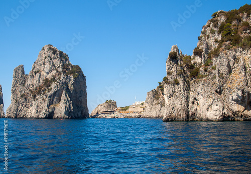 View from the boat on the Faraglioni Rocks on Capri Island  Italy.