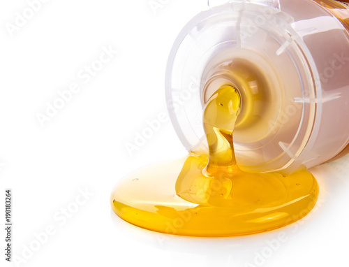 honey in plastic tube isolated on white background