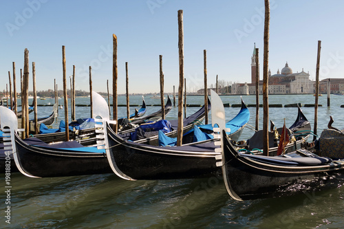 Italy, Venice, gondolas on the Lagoon of Venice and in the background San Giorgio Maggiore