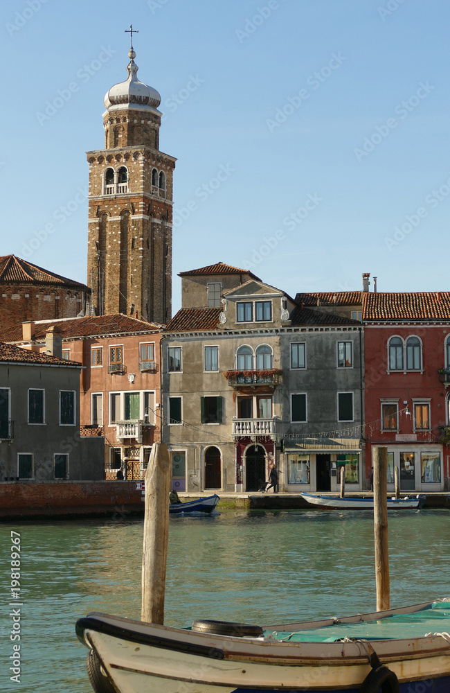 Italy, Venice, Murano Island, houses and the campanile of the Basilica of Santa Maria e San Donato