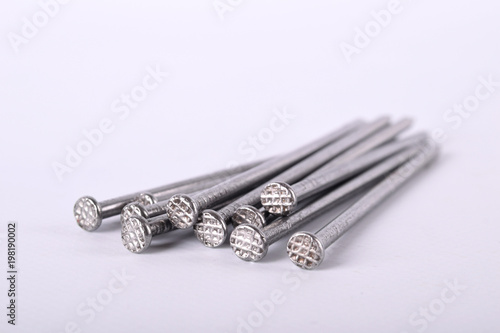  Set of metal iron nails nail on white background