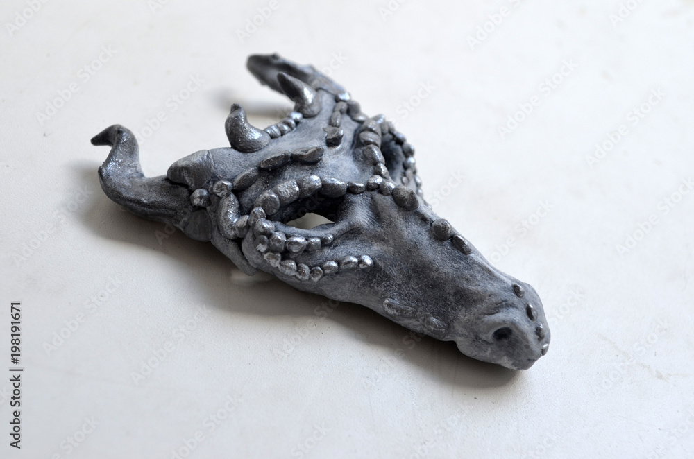Gray and silver dragon mask Gray and silver dragon mask
