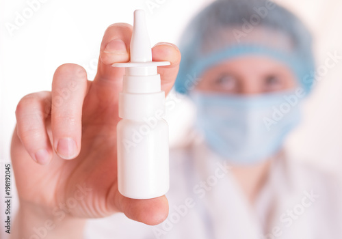 Doctor keeps the nosal spray