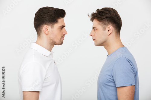 Quadro em tela Full length portrait of two angry young men