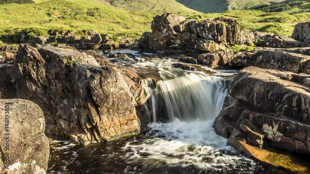 Dolly shot time lapse with long time exposure of the paradisal waterfall landscape in Glen Etive, Scotland - United Kingdom Dolly shot time lapse with long time exposure of the paradisal waterfall landscape in Glen Etive, Scotland - United Kingdom