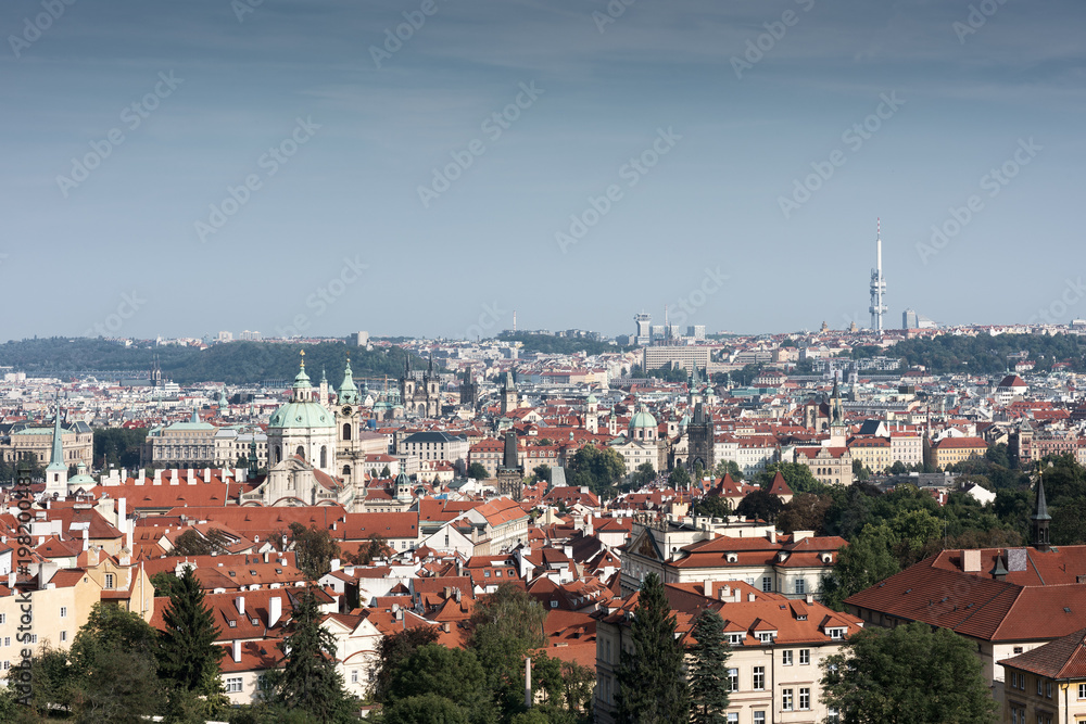 The historical centre of Prague. The European urban landscape. Red rooftops, towers, and cathedrals