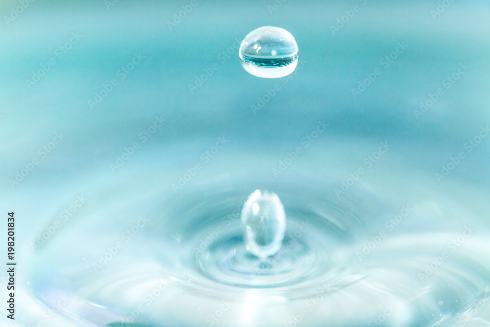 Blue waterdrop from close perspective Blue waterdrop from close perspective