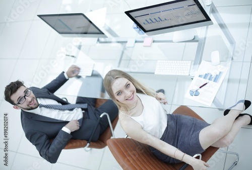 business people sitting at office desk in office. top view © ASDF