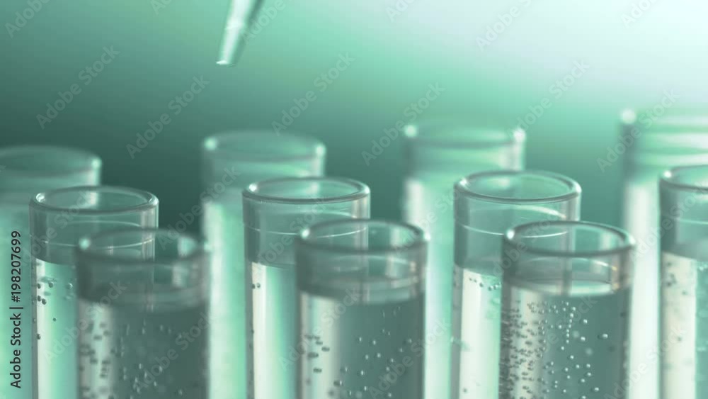 a scientist with a pipette analyzes a colored liquid to extract the DNA and molecules in the test tubes. a scientist with a pipette analyzes a colored liquid to extract the DNA and molecules in the test tubes.