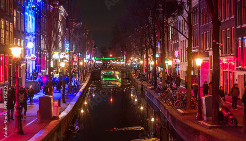 Amsterdam red district prostitution quarter street, canal at night