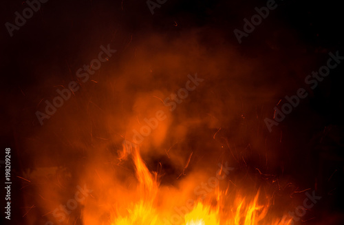 fire with smoke on a black background