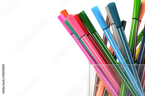 Colorful pens in clear plastic