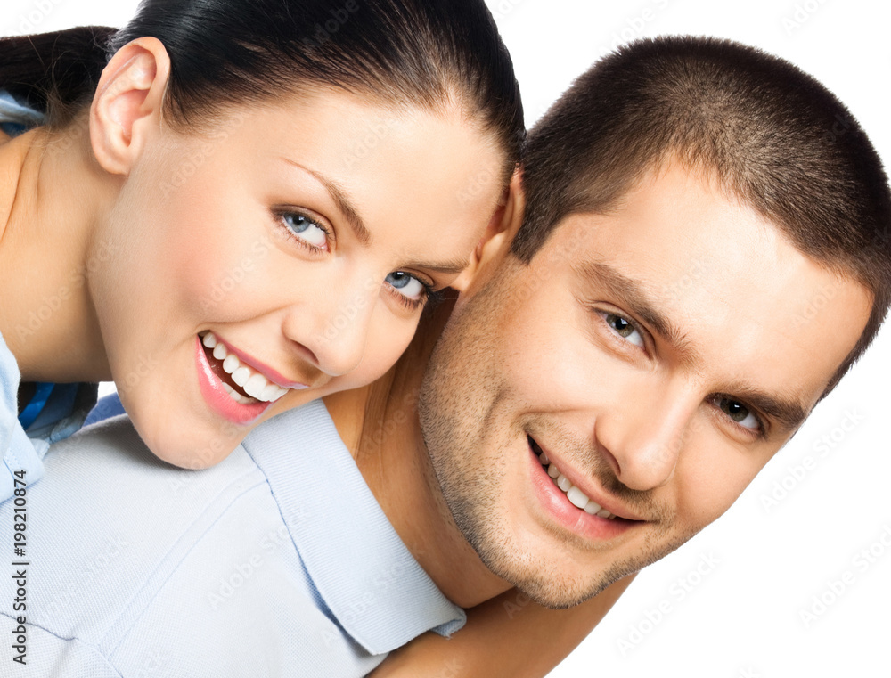 Portrait of young happy smiling attractive couple, isolated on white background Portrait of young happy smiling attractive couple, isolated on white background
