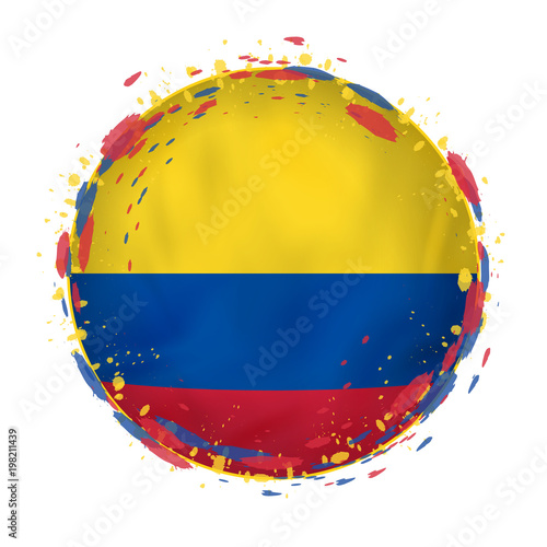 Round grunge flag of Colombia with splashes in flag color.
