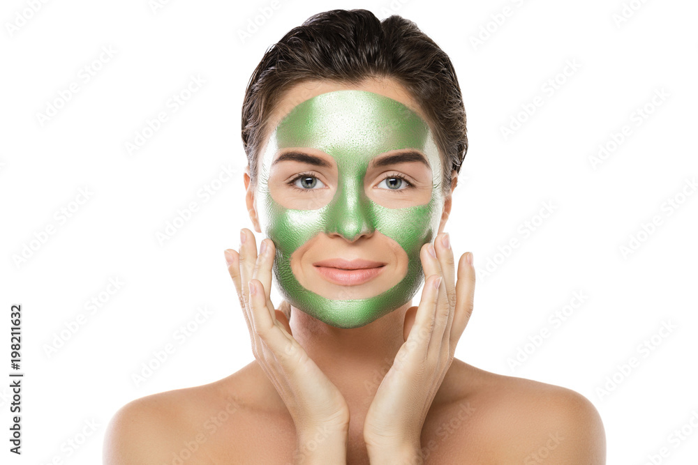 Woman with green peel-off mask on her face Woman with green peel-off mask on her face