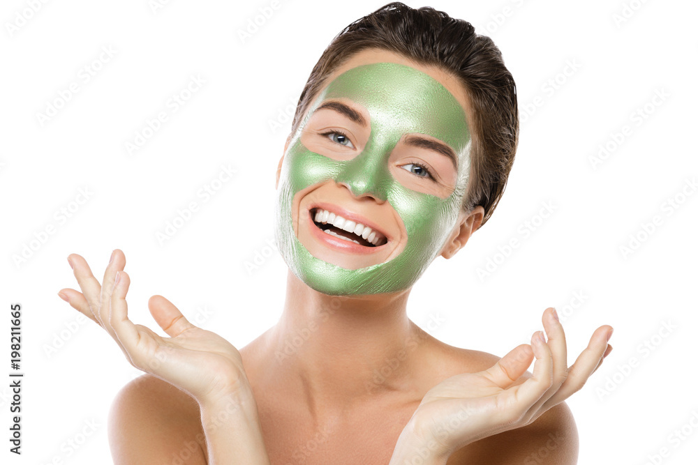 Woman with green peel-off mask on her face