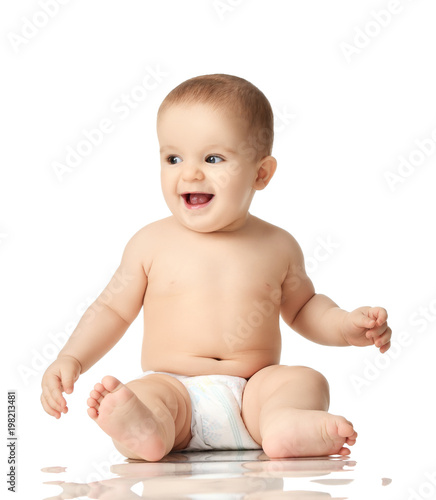 8 month infant child baby boy kid toddler sitting in diaper thinking happy laughing isolated on a white © Dmitry Lobanov