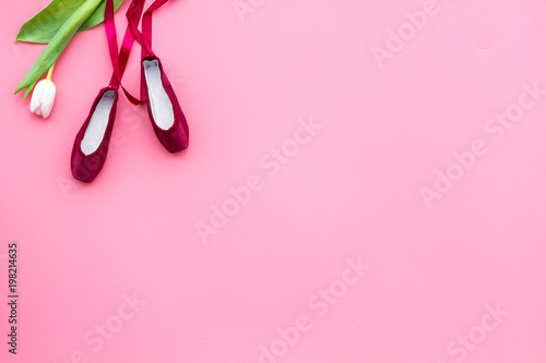 Professional dance shoes. Ballet concept. Pointes on pink background top view copy space