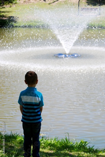 Boy Watching Fountain