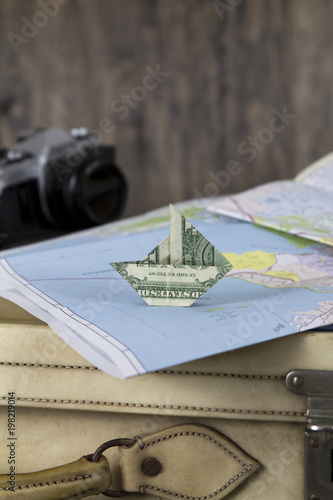 Paper Money Sailboat on a Map