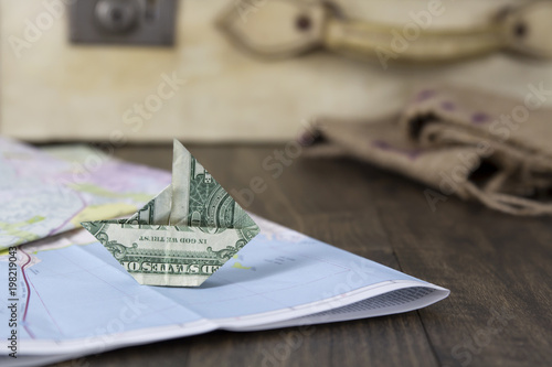 Paper Money Sailboat on a Map