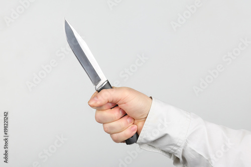 knife in the hands of a man.