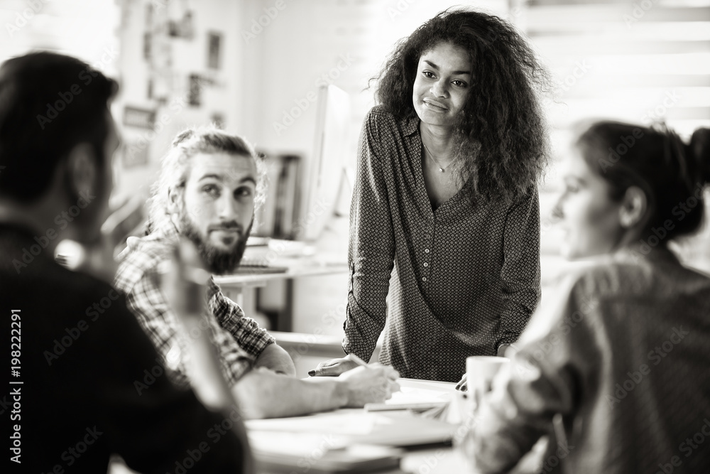 Φωτογραφία Meeting at office. a black woman talking with her colleagues