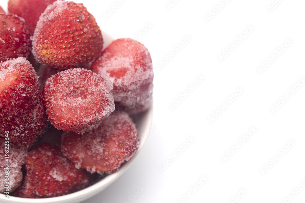 Frozen Strawberries on a White Background Frozen Strawberries on a White Background