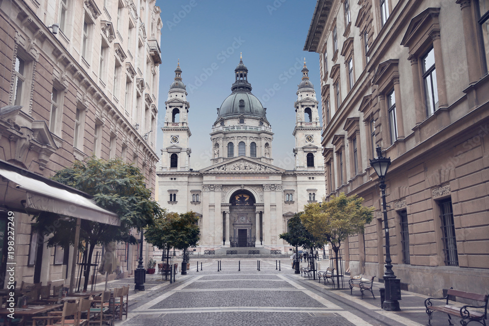 Budapest - St. Stephen's Basilica, Hungary. View of Szent Istvan Bazilika over blue sky from Zrinyi Utca.
