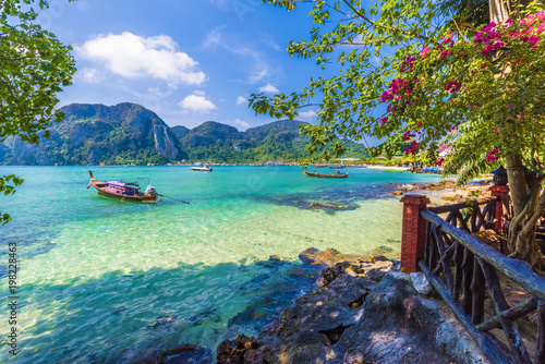 Beautiful summer scene and destination with mountains and turquoise sea water in Ton Sai Bay village  region of Phi Phi  Thailand