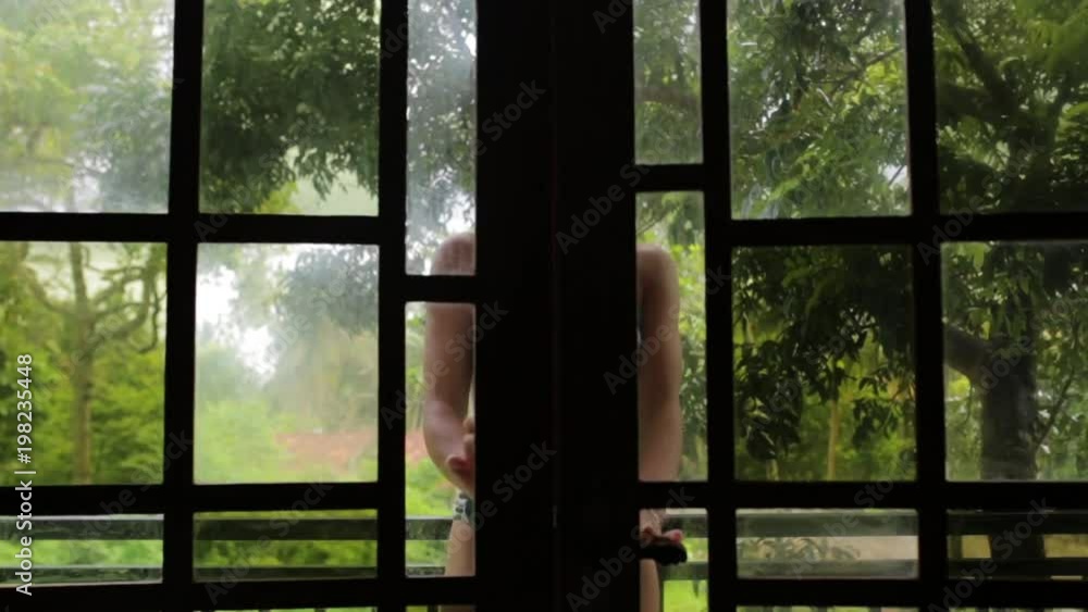 a girl in a swimsuit in a bungalow. a girl in a swimsuit in a bungalow.