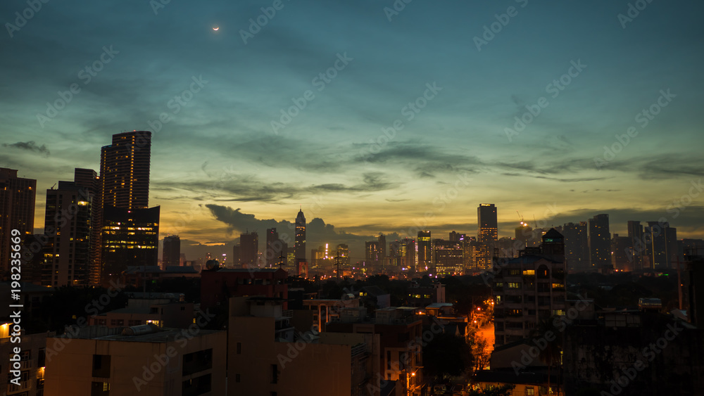 Panorama of the City of Manila with skyscrapers early in the morning.