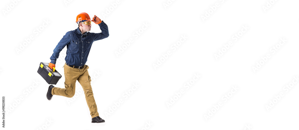 Portrait of repairman (builder) in helmet and with tool box in hands isolated on white background. Copy space Portrait of repairman (builder) in helmet and with tool box in hands isolated on white background. Copy space