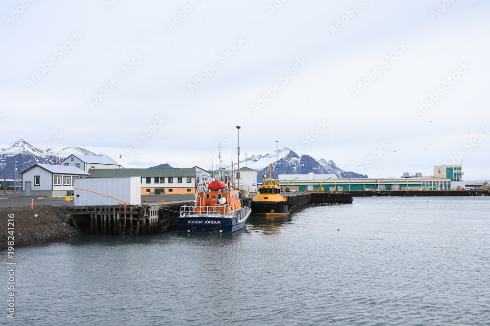 Transportation ship park in Hornafjordur port, a blooming community in the realm of the greatest glacier in southeast Iceland.