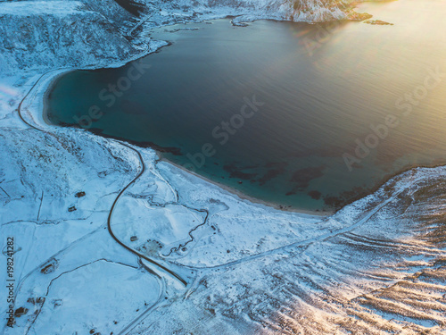 Aerial winter view of Lofoten Islands beach, Norway, shot from drone photo