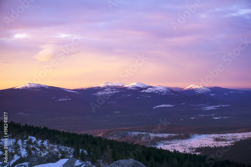 landscape - morning dawn in the mountains of the Northern Urals in the vicinity of Mount Konzhakovskiy Kamen photo