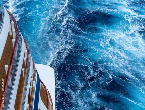 View down at the aft of cruise ship with churning ocean