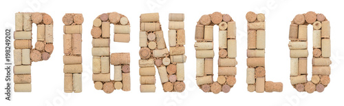 Grape variety Pignolo made of wine corks Isolated on white background photo