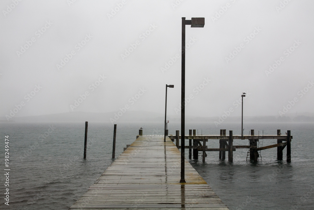 Pier in rainy day