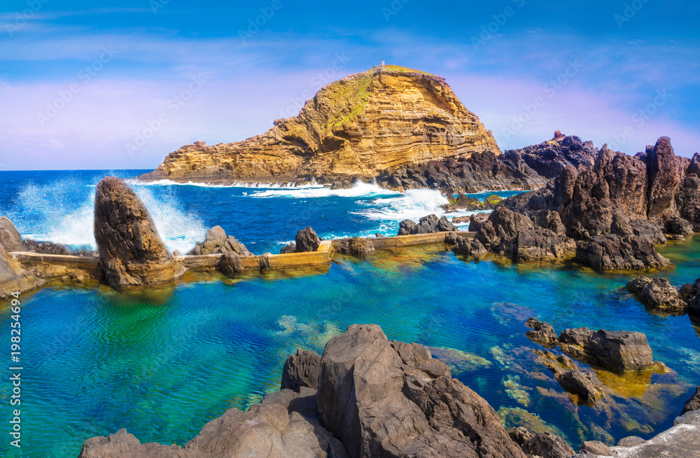 Amazing landscape with natural famous swimming pools of Porto Moniz in Madeira island, Portugal