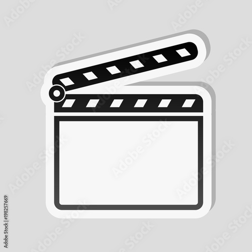 Film clap board cinema open icon. Sticker style with white border and simple shadow on gray background
