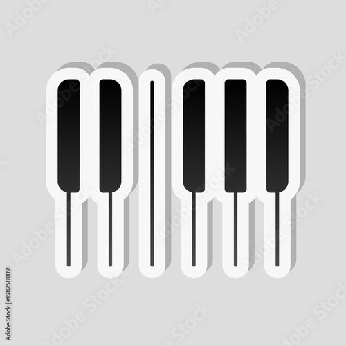 Piano keyboard icon. Horizontal view. Sticker style with white border and simple shadow on gray background