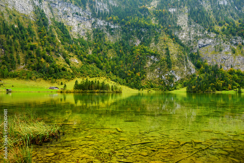 Stunning deep green waters of Konigssee, known as Germany's deepest and cleanest lake, located in the extreme southeast Berchtesgadener Land district of Bavaria.