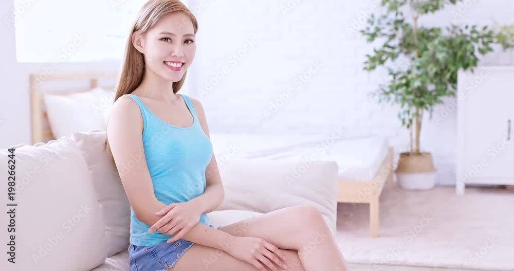 woman sit on sofa woman sit on sofa
