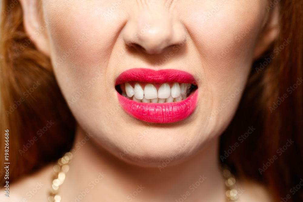 Fototapeta premium Facial Expressions Of Young Redhead Woman On Brick Wall