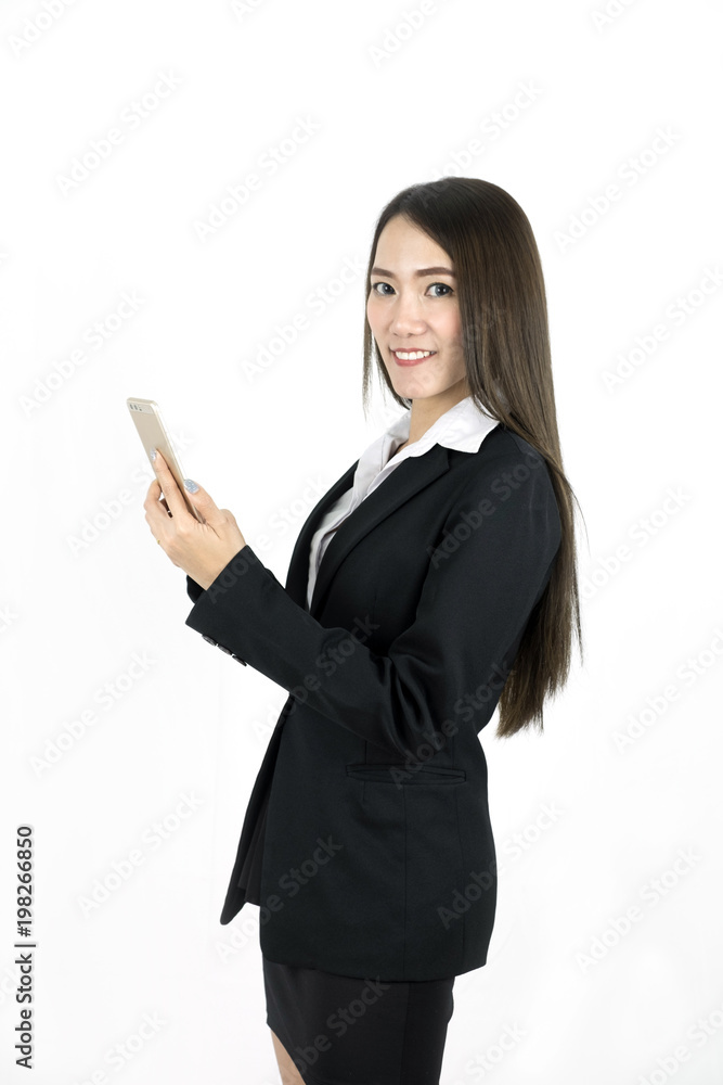 Young Asian Business woman smile use the mobile phone isolated on white background. Young Asian Business woman smile use the mobile phone isolated on white background.