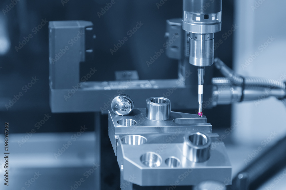 The CMM probe attach on the CNC milling machine measure the automotive part . The CMM probe attach on the CNC milling machine measure the automotive part .