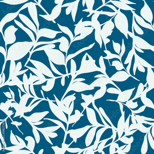 Background seamless pattern of tossed leaves on blue