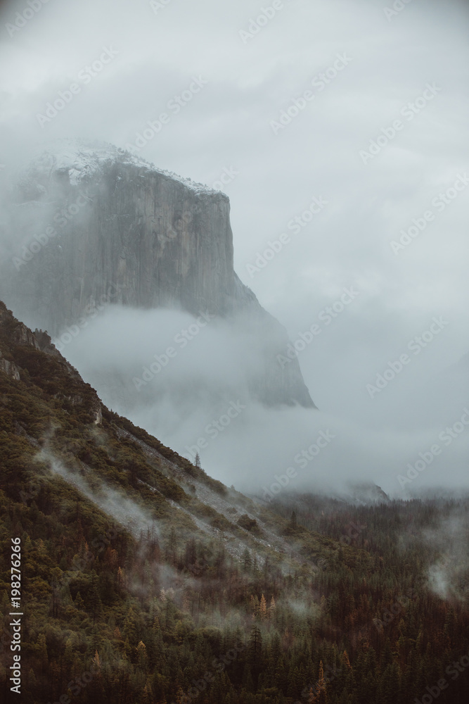 Scenic view of mountain in fog Scenic view of mountain in fog